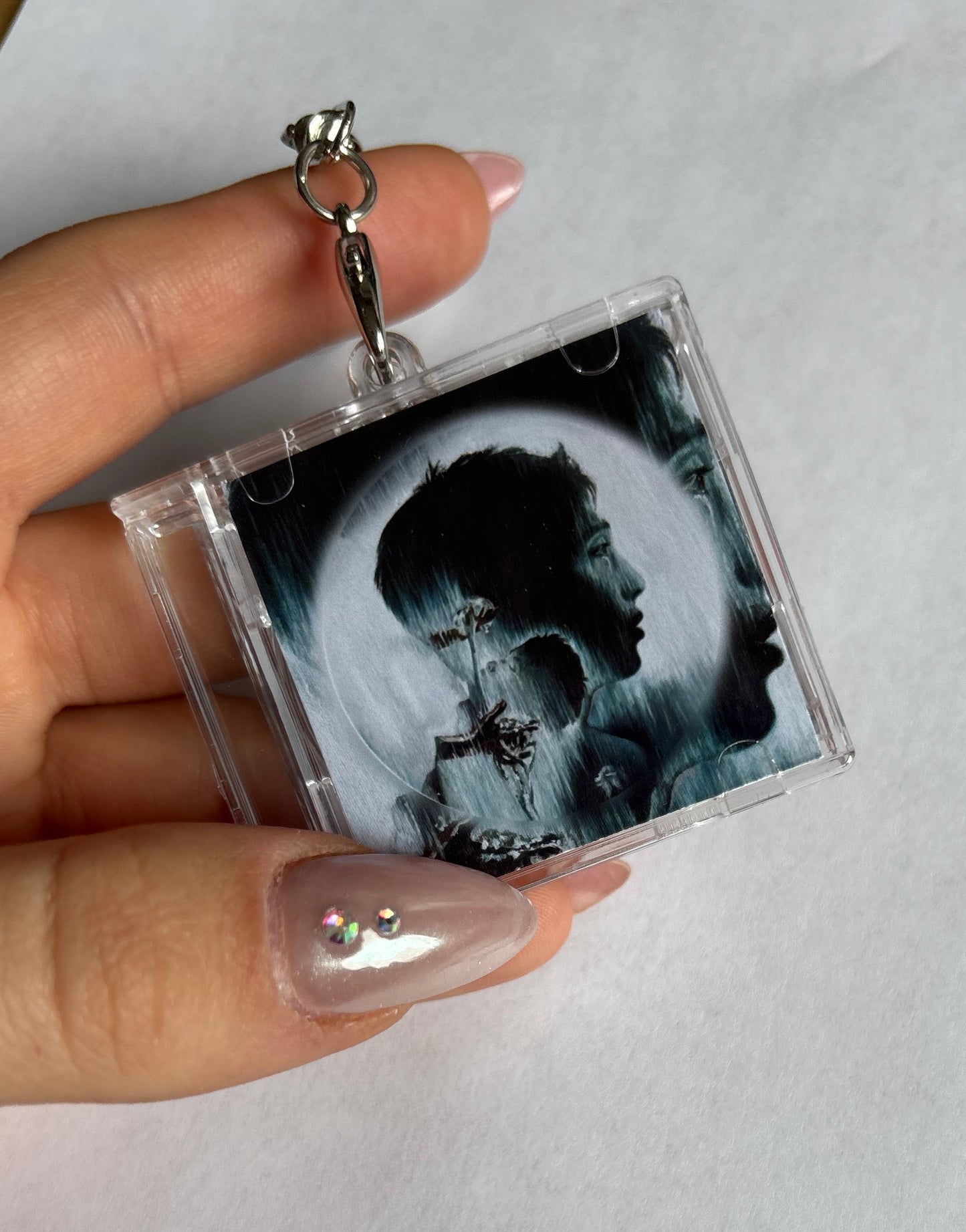 "STOP THE RAIN" keychain