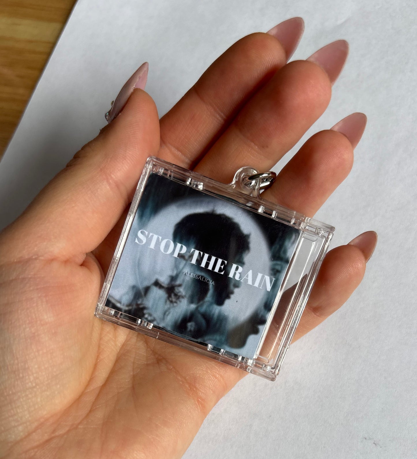 "STOP THE RAIN" keychain